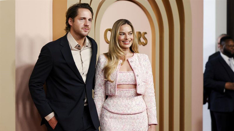 Марго Роби и Том Акерли